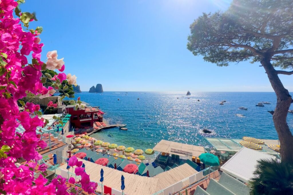 Vibrant seaside view with flowers. Naples, Italy